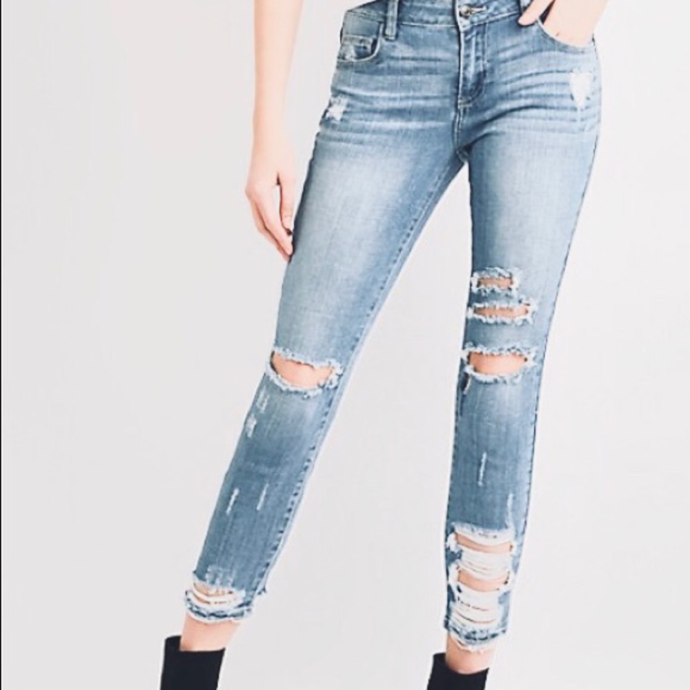 Mid/ high rise distressed jeans